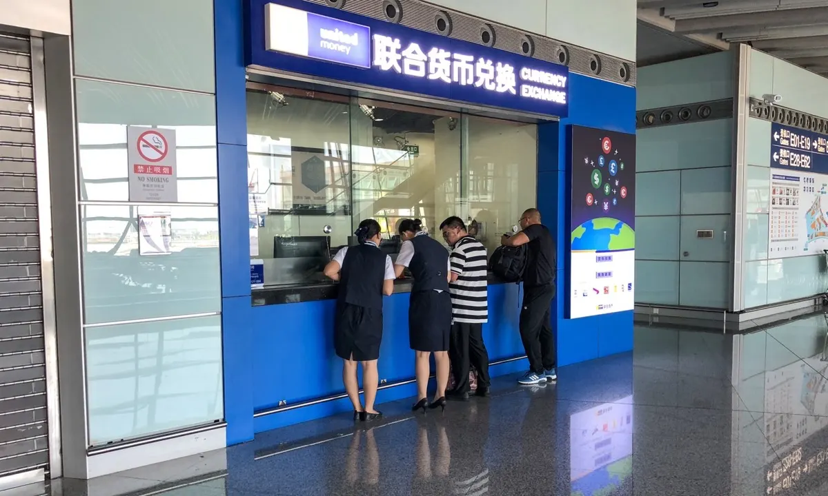 Currency exchange board in Dubai showing remittance rates
